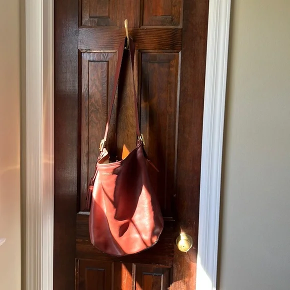 Saddle-color Coach Crossbody Bucket - Picture 2 of 14